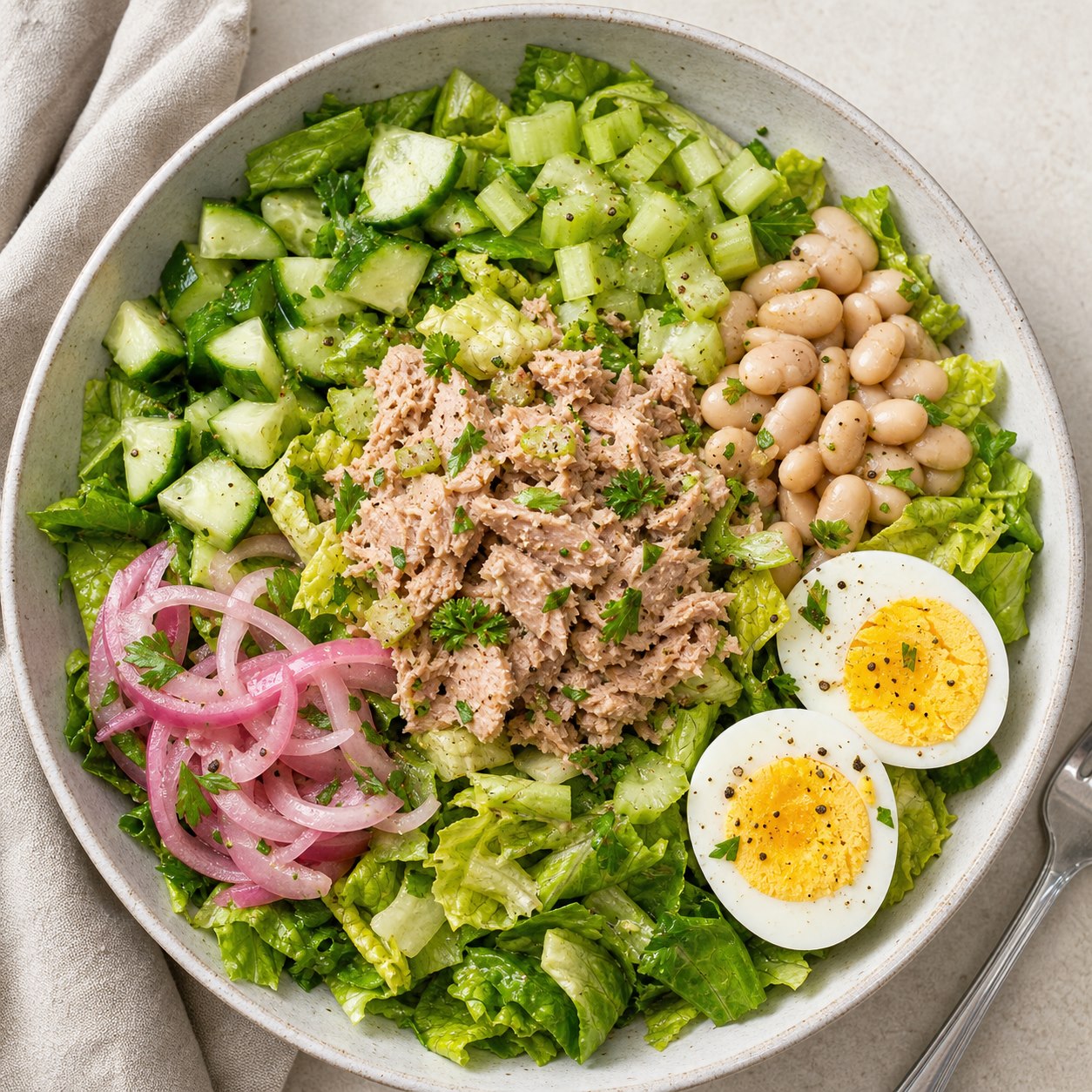 Crisp salad bowl packed to avoid soggy greens